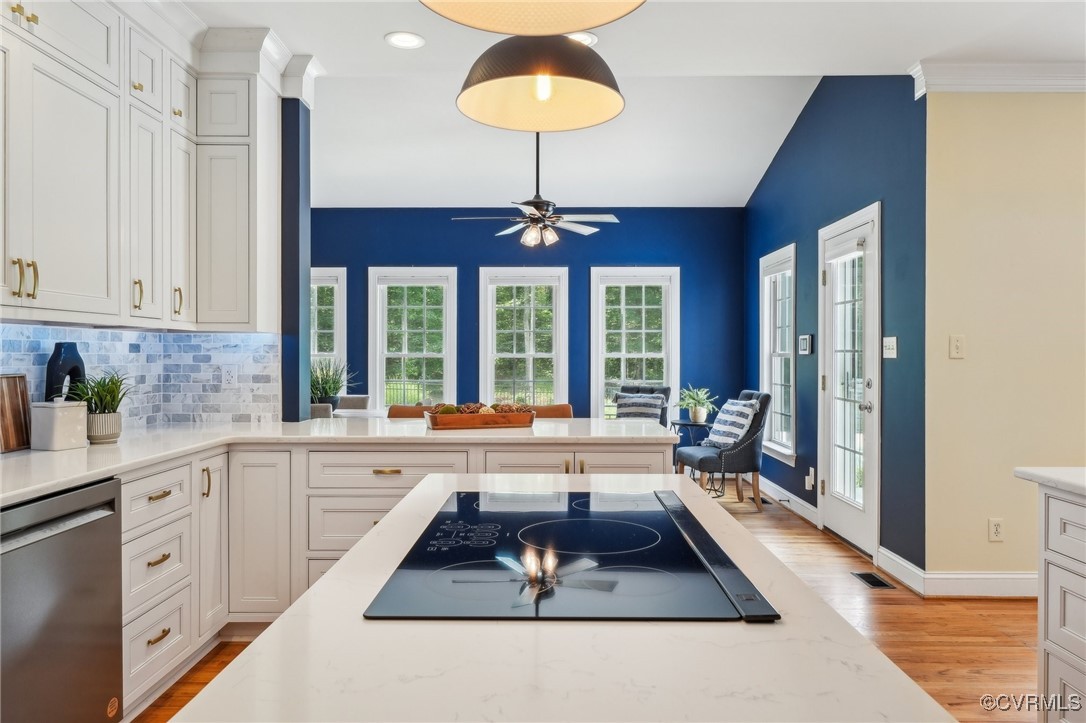 17501 Old Ridge Road Montpelier, VA 23192 - Photo 6 of 45 a kitchen with stainless steel appliances granite countertop a stove a sink and a granite counter tops with white cabinets