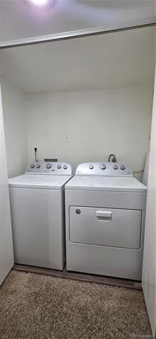 a utility room with a washer and dryer