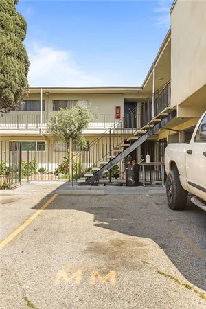 a view of a street with cars
