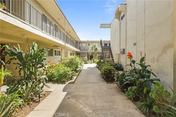 a view of a pathway along the building