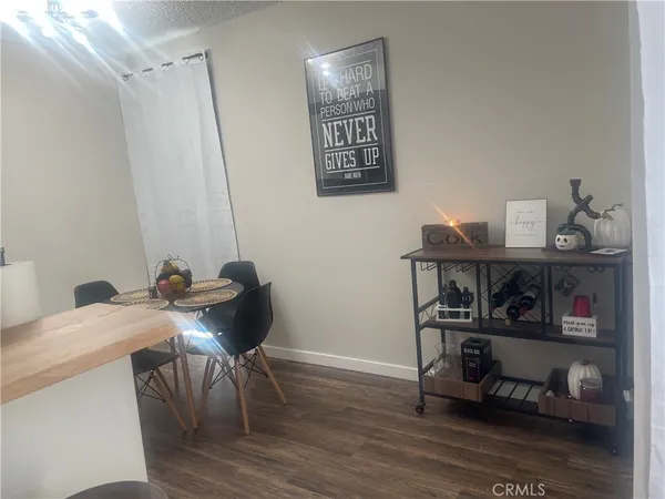 a workspace with furniture and wooden floor