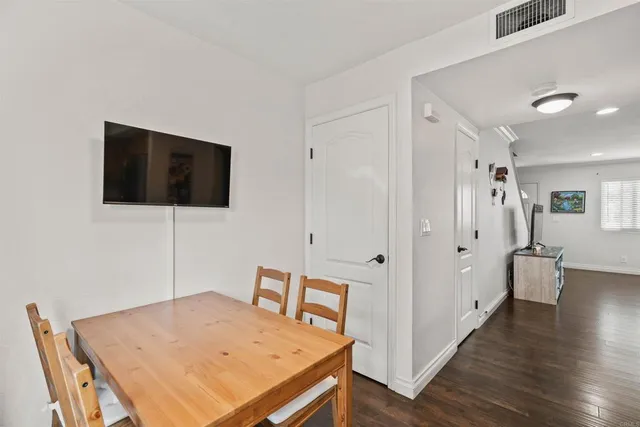 a view of a livingroom with furniture and wooden floor