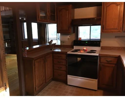117 Reservation Road Sunderland, MA 01375 - Photo 15 of 30 a kitchen with a stove and a microwave