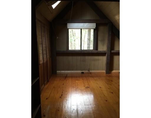 117 Reservation Road Sunderland, MA 01375 - Photo 20 of 30 a view of an empty room with wooden floor and a window