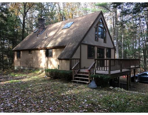 117 Reservation Road Sunderland, MA 01375 - Photo 2 of 30 a view of a house with backyard and wooden fence