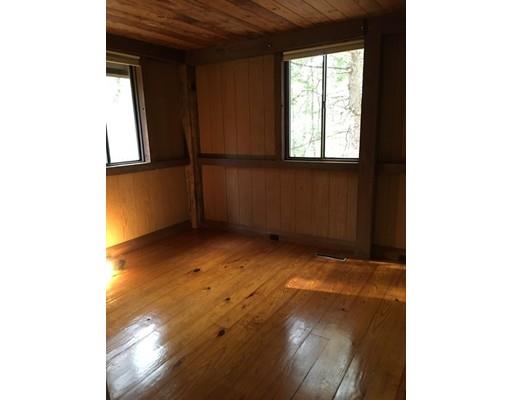 117 Reservation Road Sunderland, MA 01375 - Photo 9 of 30 a view of an empty room and window
