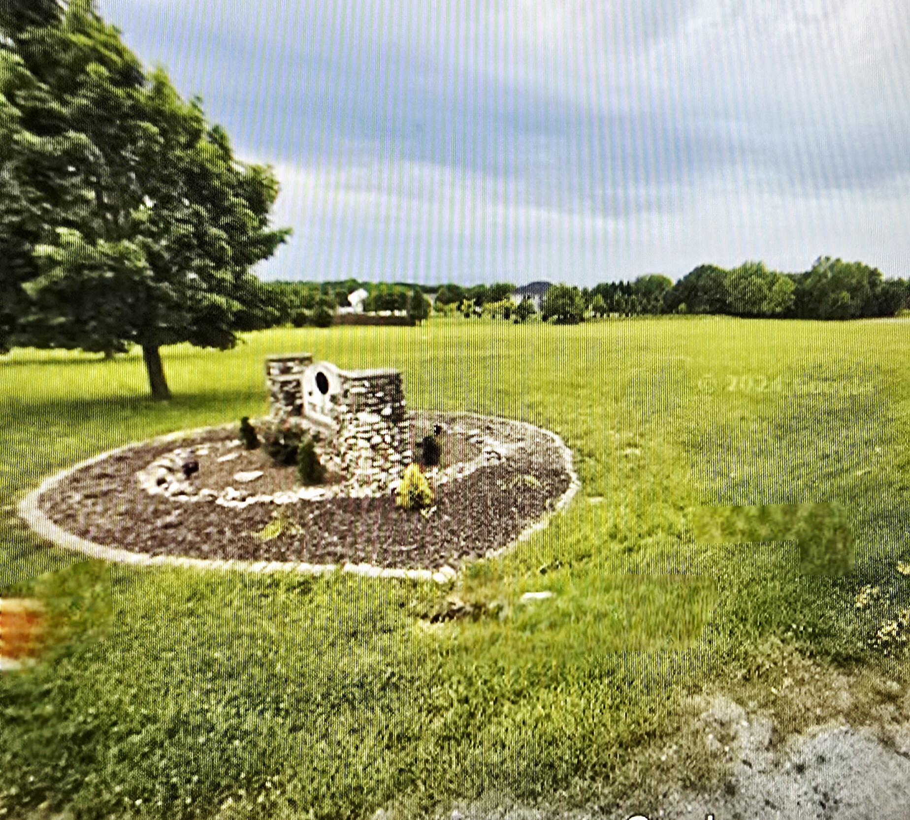 7033 East 109th Avenue Crown Point, IN 46307 - Photo 2 of 2 a view of a lake with a big yard
