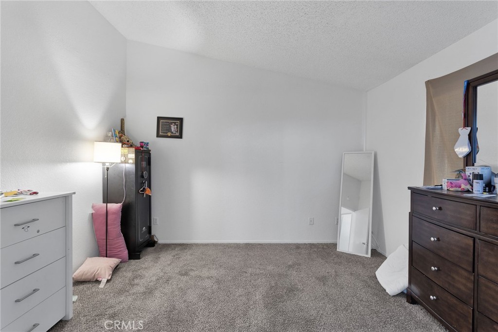22517 Ojai Road Apple Valley, CA 92308 - Photo 20 of 25 a view of livingroom with furniture and natural light