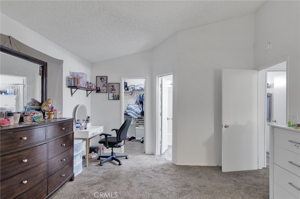 22517 Ojai Road Apple Valley, CA 92308 - Photo 21 of 25 a view of a workspace with furniture