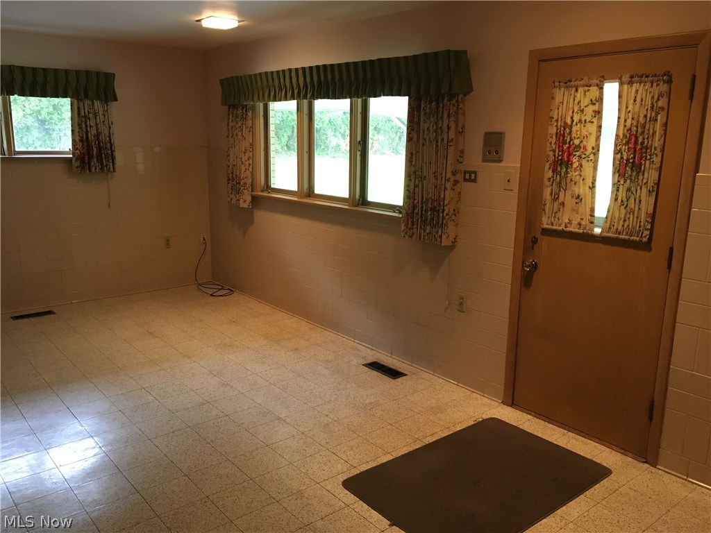 7457 Warren - Sharon Road Brookfield, OH 44403 - Photo 6 of 24 The laundry room is so large, it can double as another space.