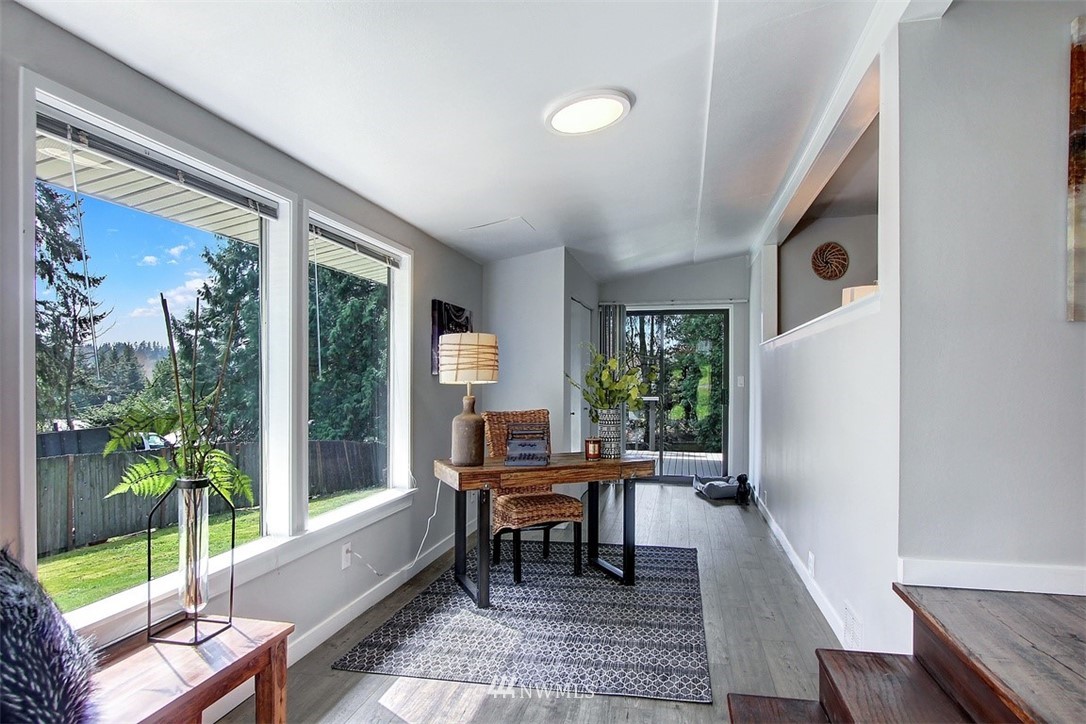 24108 7th Avenue West Bothell, WA 98021 - Photo 4 of 20 a living room with furniture and a large window