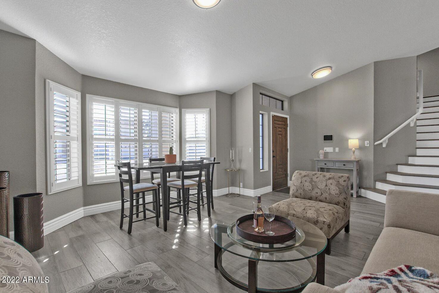 1142 East Kings Avenue Phoenix, AZ 85022 - Photo 16 of 45 Living Room and Formal Dining Area