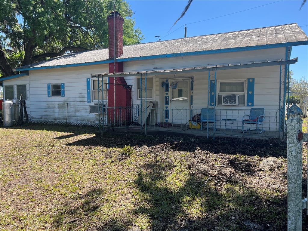 9128 Hall Road Lakeland, FL 33809 - Photo 1 of 1 a front view of house with yard