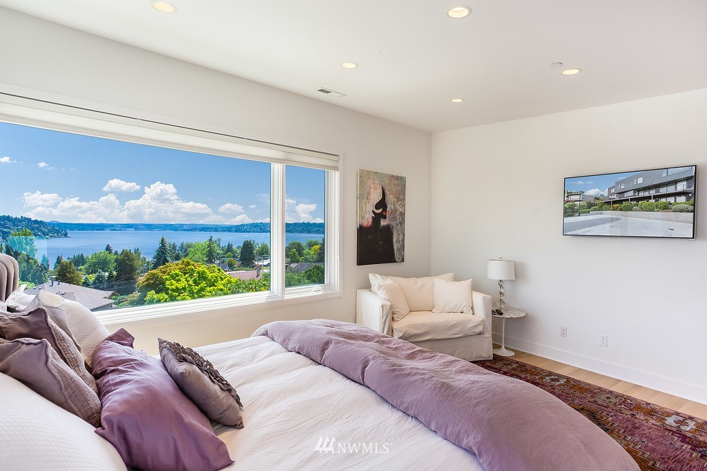 5505 South Upland Road Seattle, WA 98118 - Photo 14 of 32 a living room with furniture and a floor to ceiling window