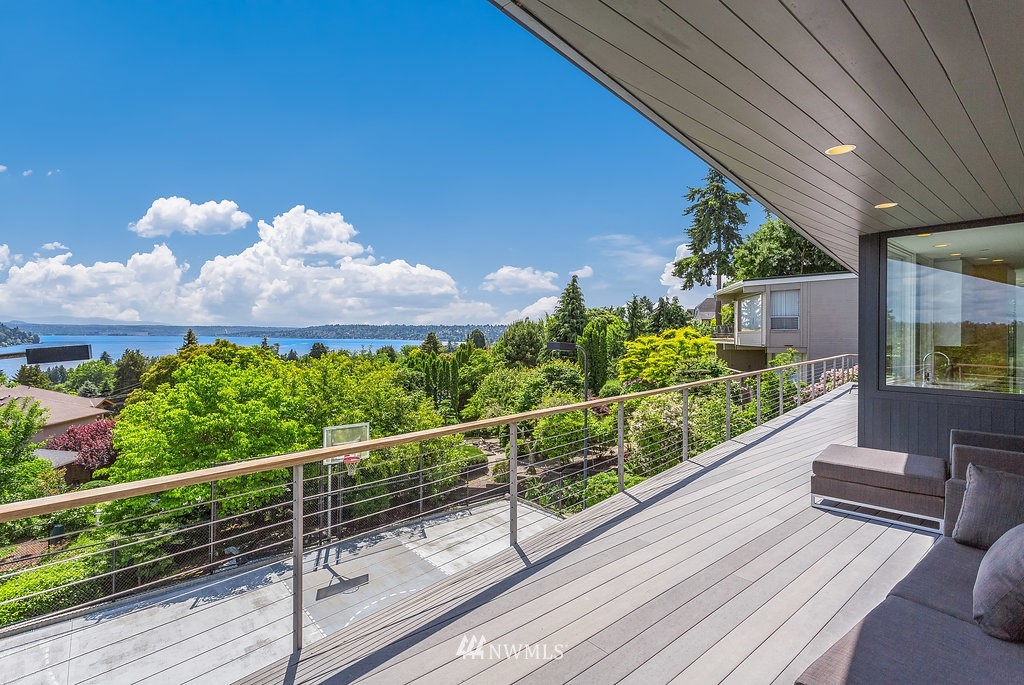 5505 South Upland Road Seattle, WA 98118 - Photo 29 of 32 a view of a balcony with wooden floor