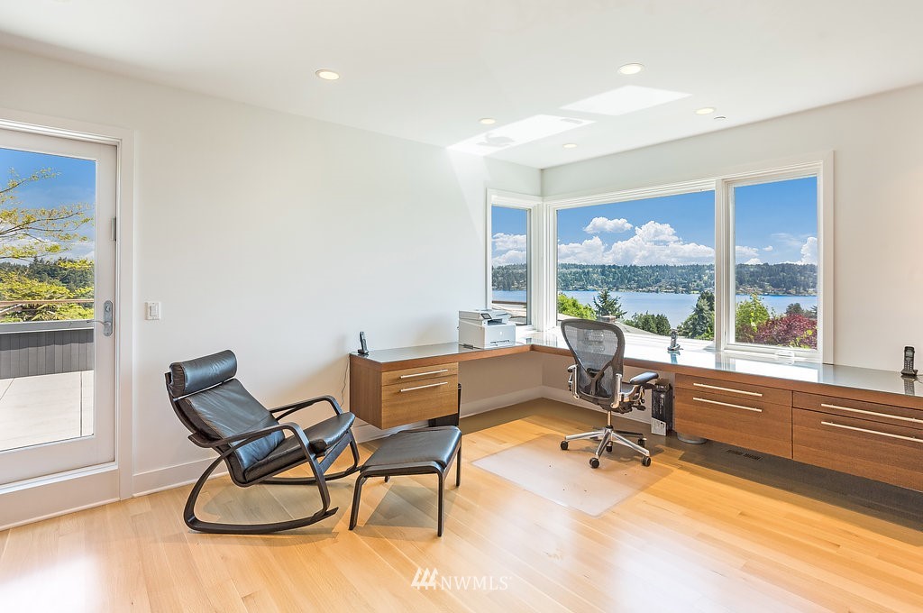 5505 South Upland Road Seattle, WA 98118 - Photo 7 of 32 a view of a workspace with furniture and a window
