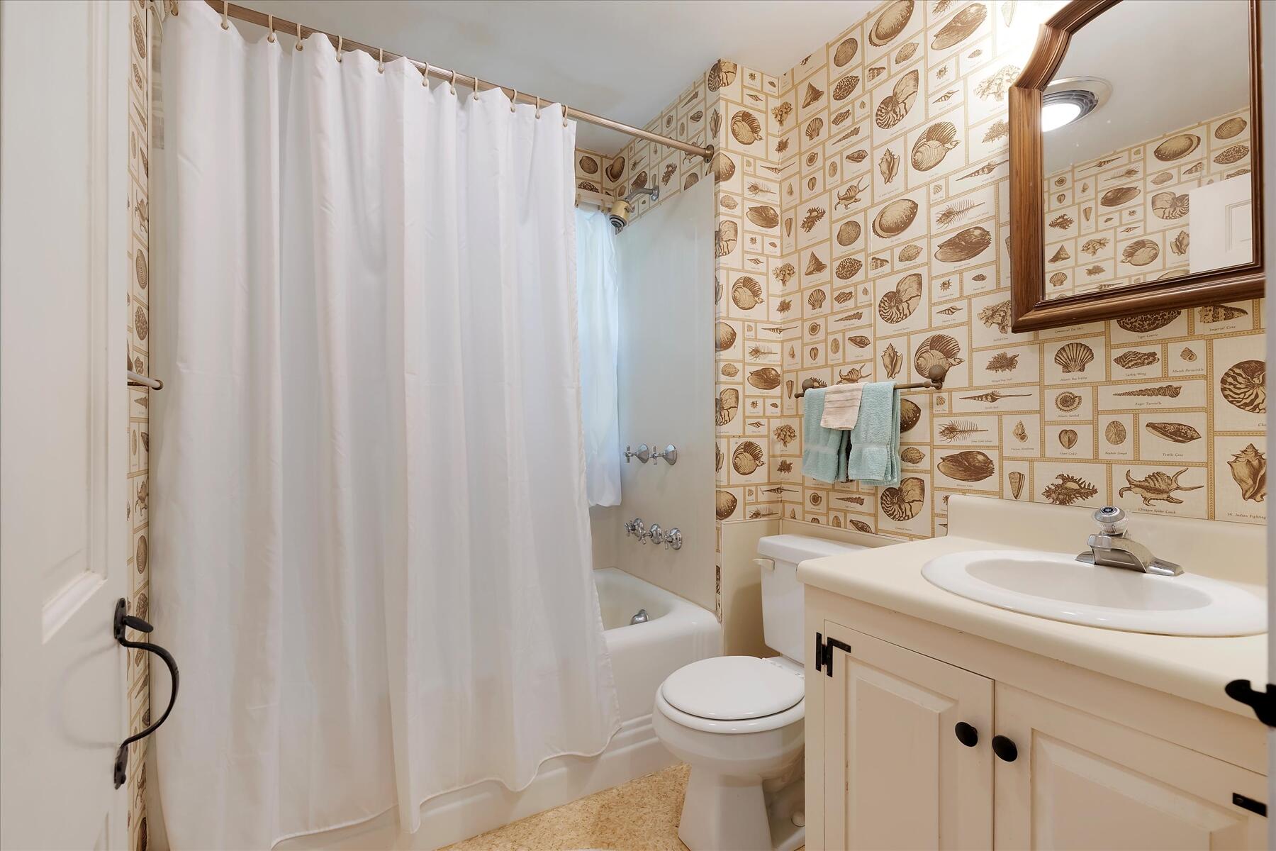 307 Bank Street Harwich, MA 02645 - Photo 19 of 45 a bathroom with a sink toilet and shower