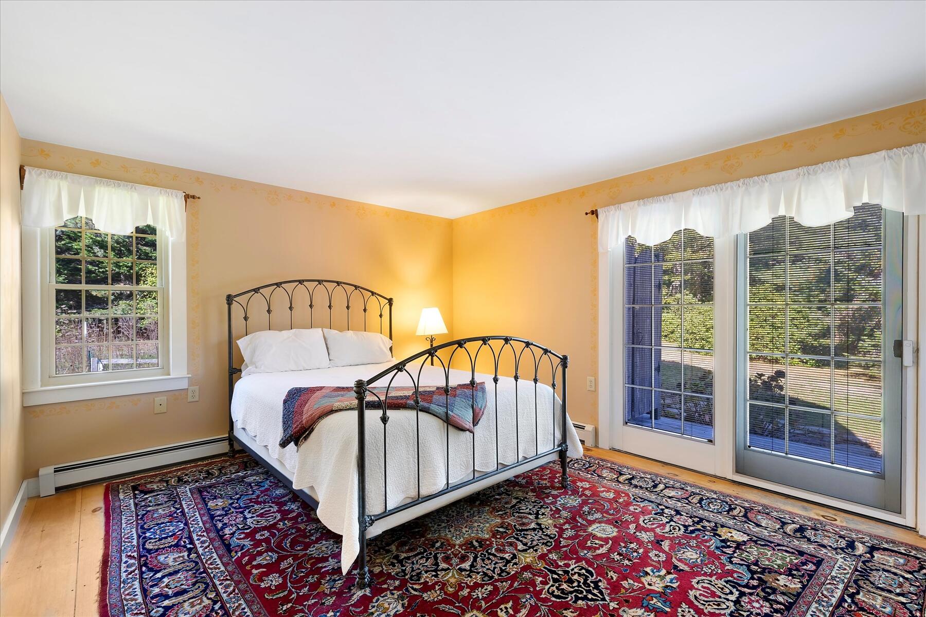 307 Bank Street Harwich, MA 02645 - Photo 23 of 45 a bedroom with furniture and a window
