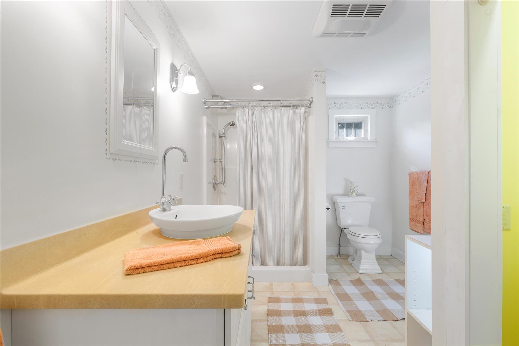 307 Bank Street Harwich, MA 02645 - Photo 24 of 45 a bathroom with a sink toilet and shower