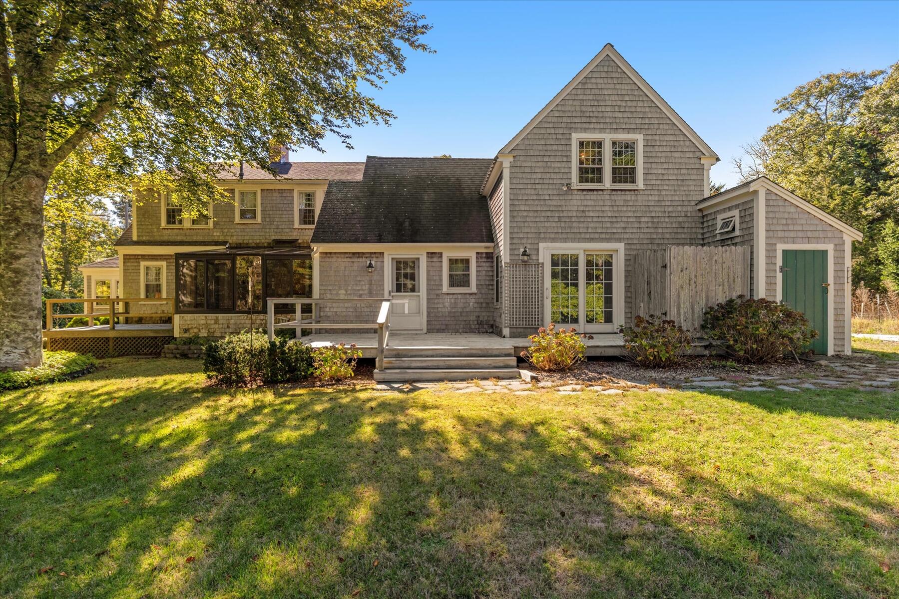 307 Bank Street Harwich, MA 02645 - Photo 32 of 45 a view of a house with a yard