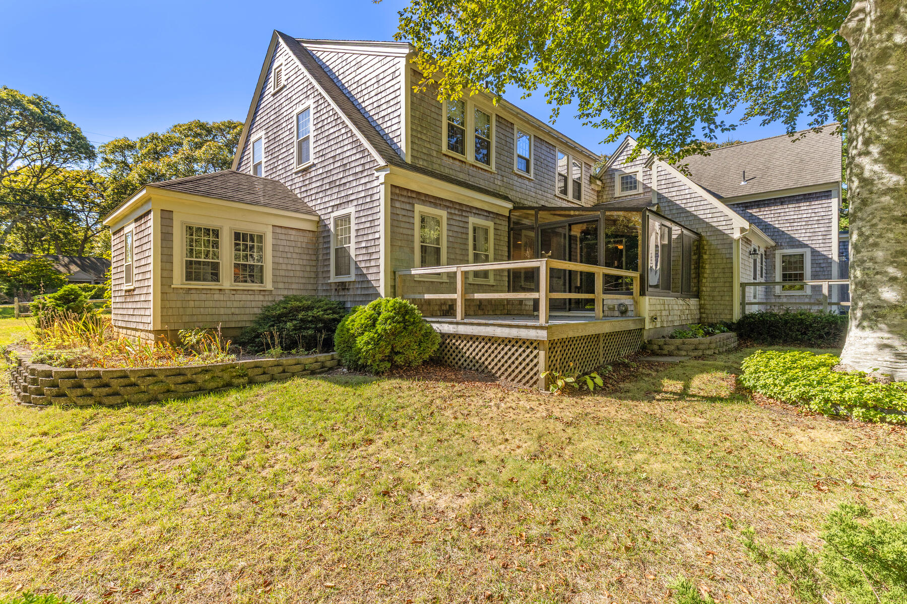 307 Bank Street Harwich, MA 02645 - Photo 33 of 45 a view of a house with a yard
