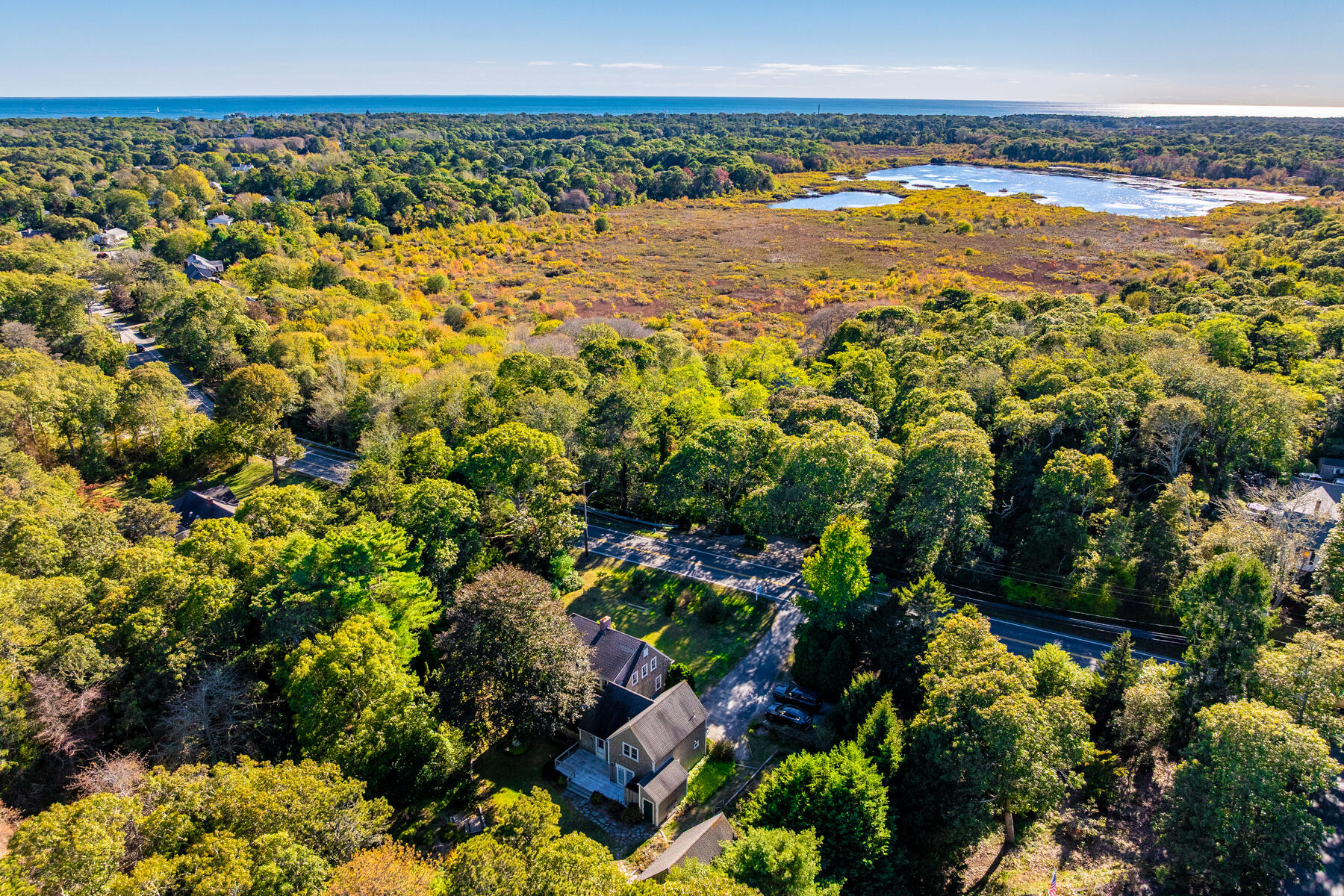 307 Bank Street Harwich, MA 02645 - Photo 41 of 45 a view of a large body of water and lots of trees