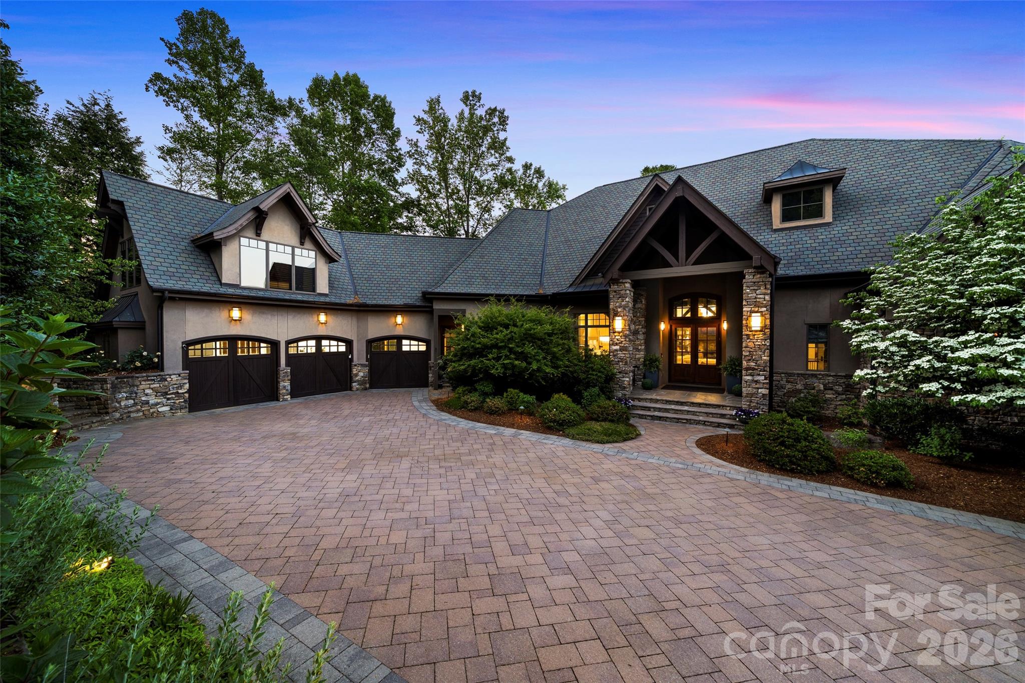 47 Ridge Pine Trail Arden, NC 28704 - Photo 2 of 47 a front view of a house with a yard and garage