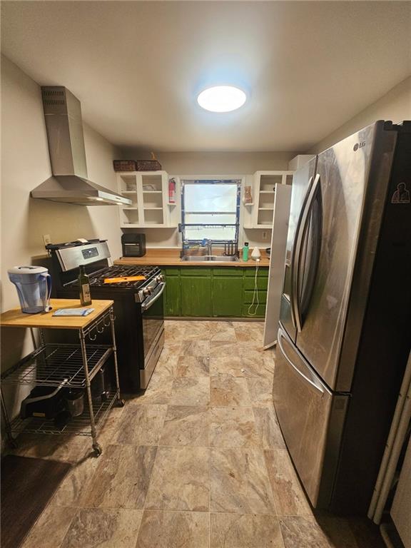 5341 Old Floyd Road Southwest Mableton, GA 30126 - Photo 3 of 8 a kitchen with stainless steel appliances a refrigerator and a stove top oven