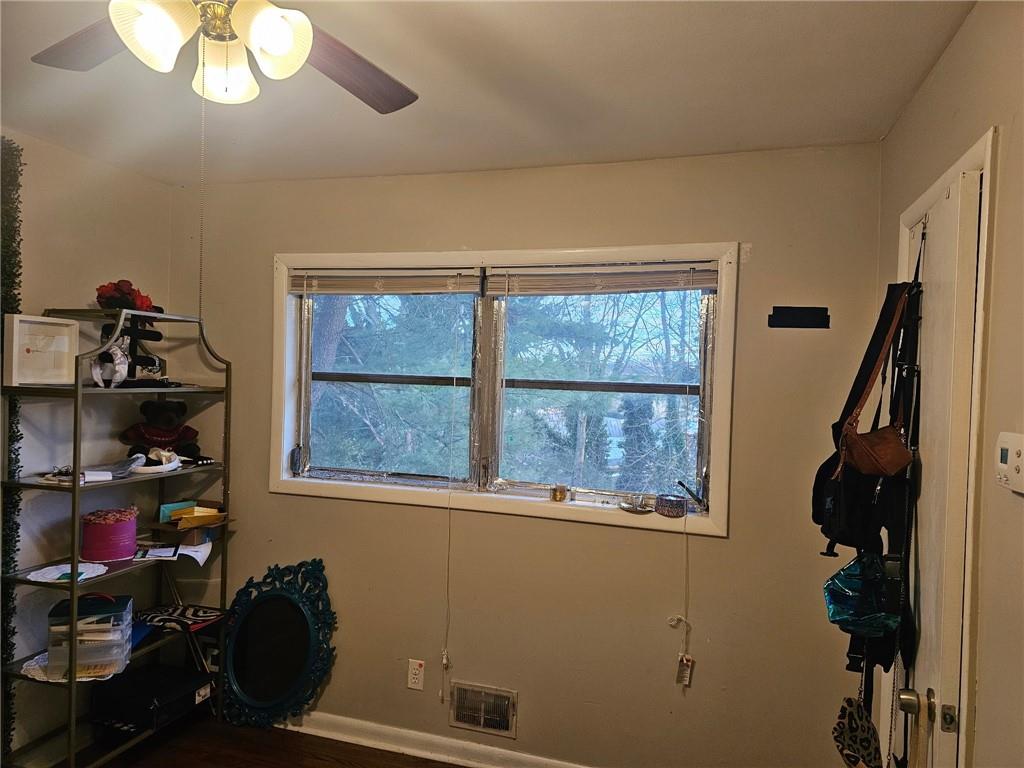 5341 Old Floyd Road Southwest Mableton, GA 30126 - Photo 7 of 8 a room with storage and a window