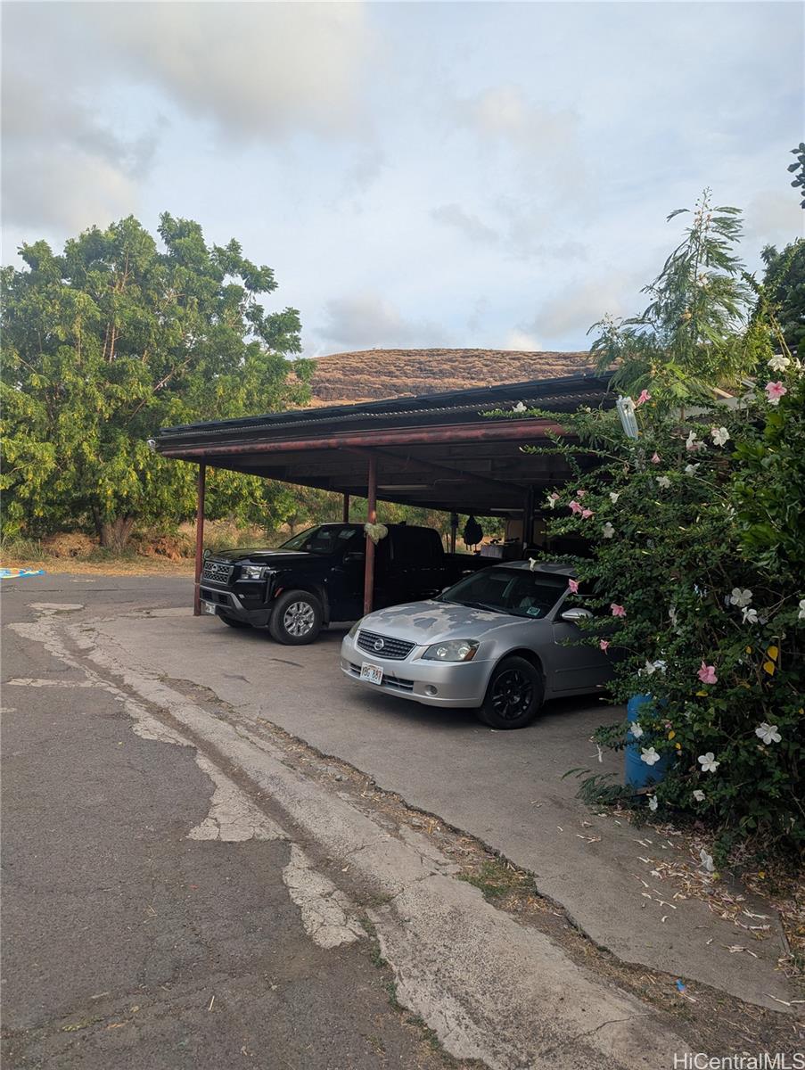 85-775A Waianae Valley Road Waianae, HI 96792 - Photo 3 of 25 a view of street with parked cars