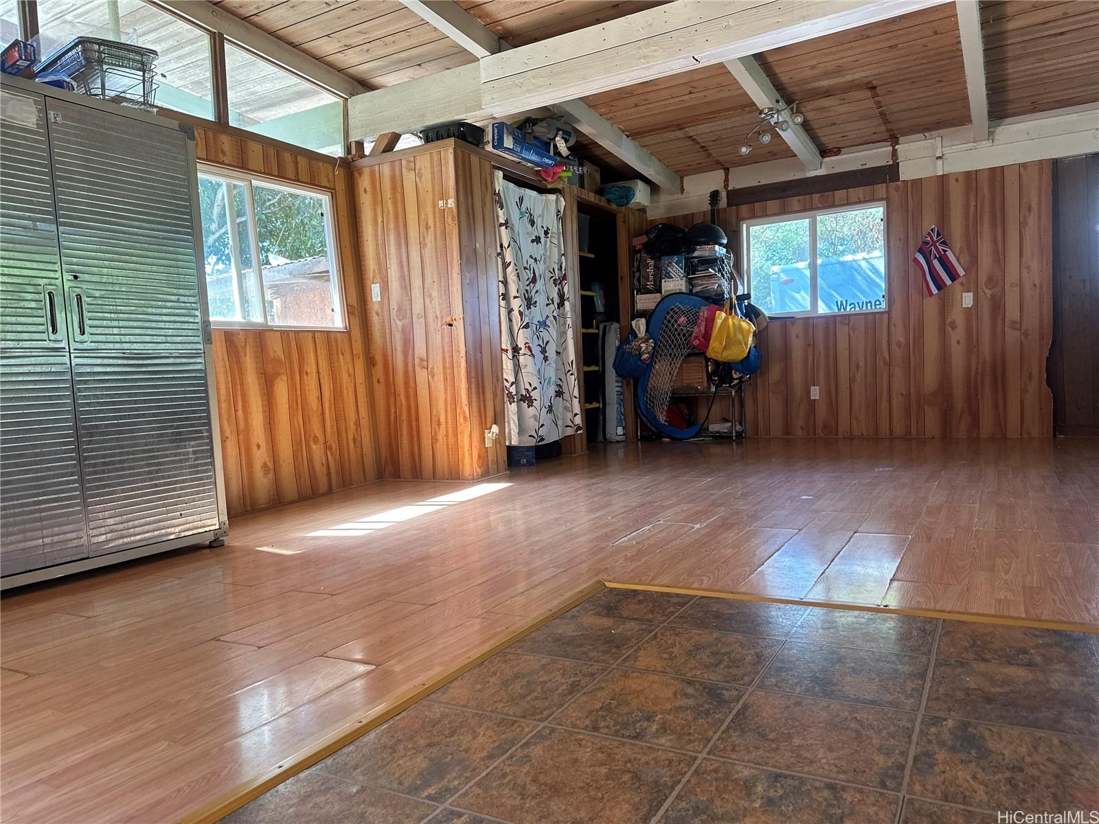 85-775A Waianae Valley Road Waianae, HI 96792 - Photo 5 of 25 a view of a livingroom with furniture and a window