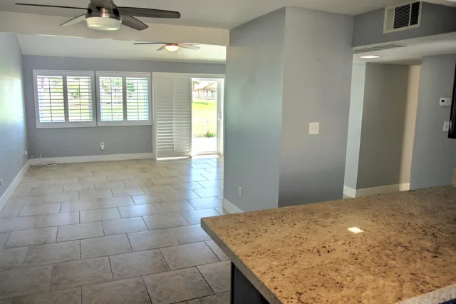 a view of an empty room and window