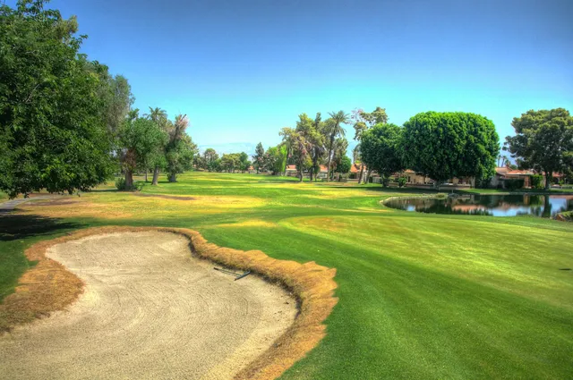 a view of a lake with a big yard