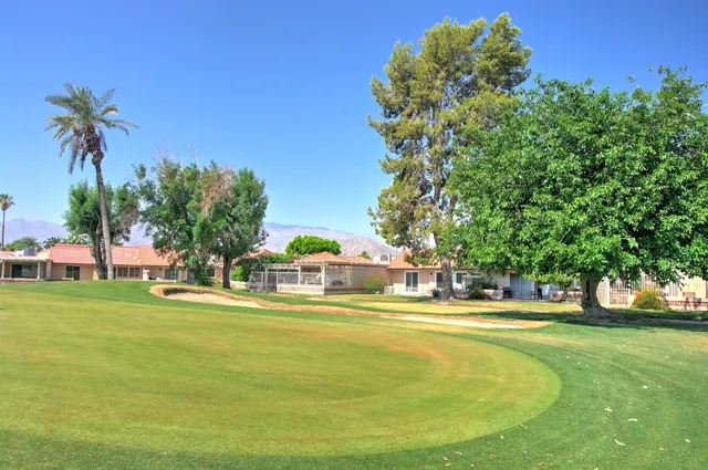 a view of a house with a swimming pool