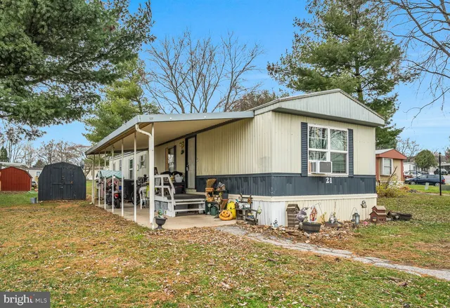 a front view of a house with a patio