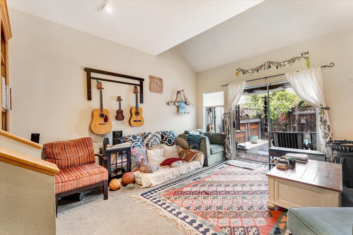7245 Lotus Way Aptos, CA 95003 - Photo 9 of 20 a living room with furniture and a large window