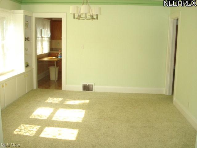 6907-6909 Ackley Road Parma, OH 44129 - Photo 6 of 25 Dining Room - Down