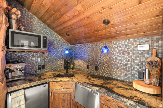 10280 Dimple Dell Road Sandy, UT 84092 - Photo 39 of 58 second floor wet bar and kitchen next to open space