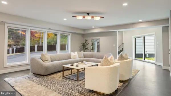 a kitchen with granite countertop a stove top oven and sink