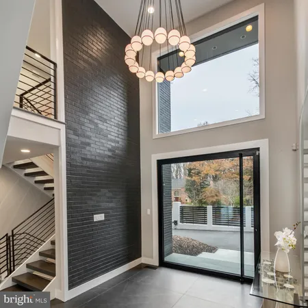 a living room with fireplace furniture and a flat screen tv