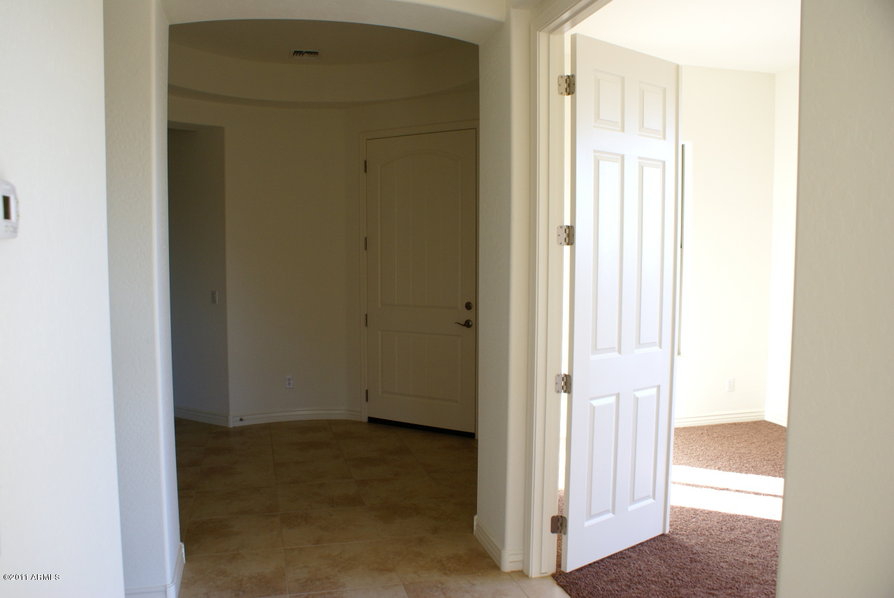 3991 East Weather Vane Road Gilbert, AZ 85296 - Photo 8 of 10 Entry with double doors to den