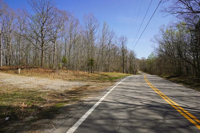 a view of road with trees
