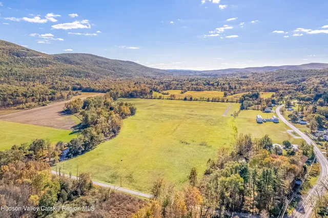 a view of a city with mountain