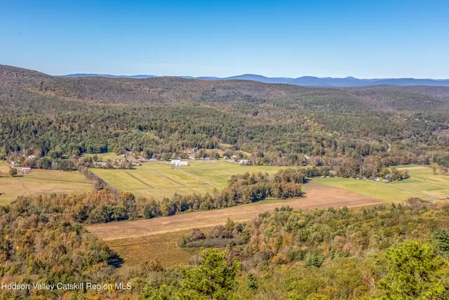 a view of lake with mountain