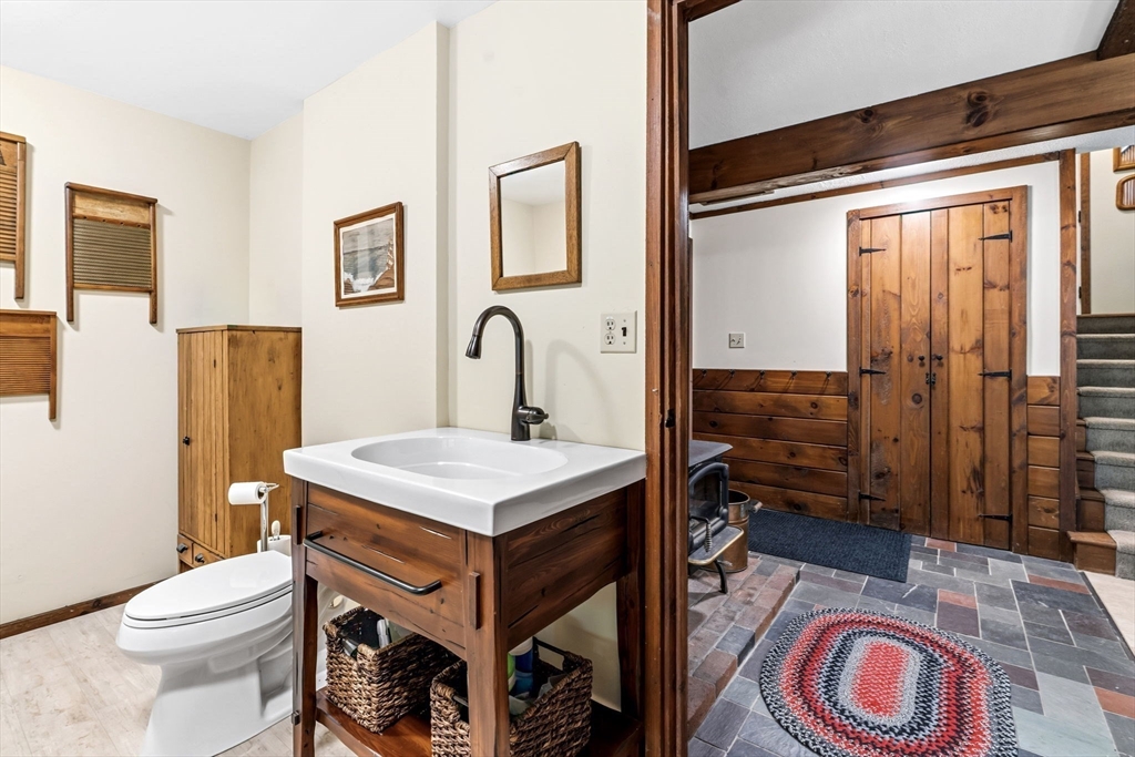 788 Burts Pit Road Northampton, MA 01062 - Photo 35 of 42 a bathroom with a toilet a sink and a shower