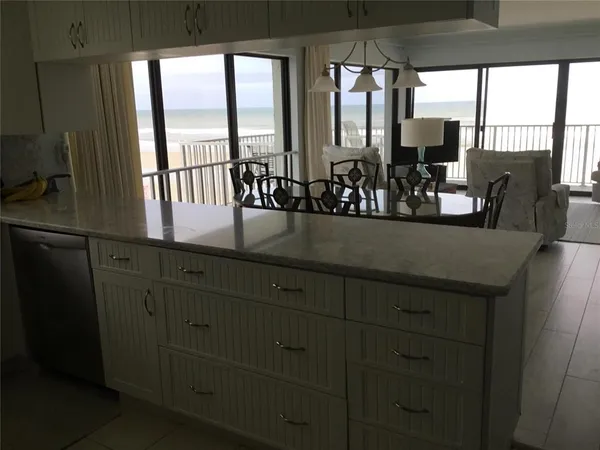 a view of dining room and wooden floor