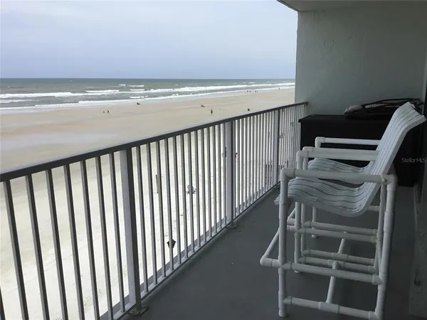 a view of a balcony with an outdoor space