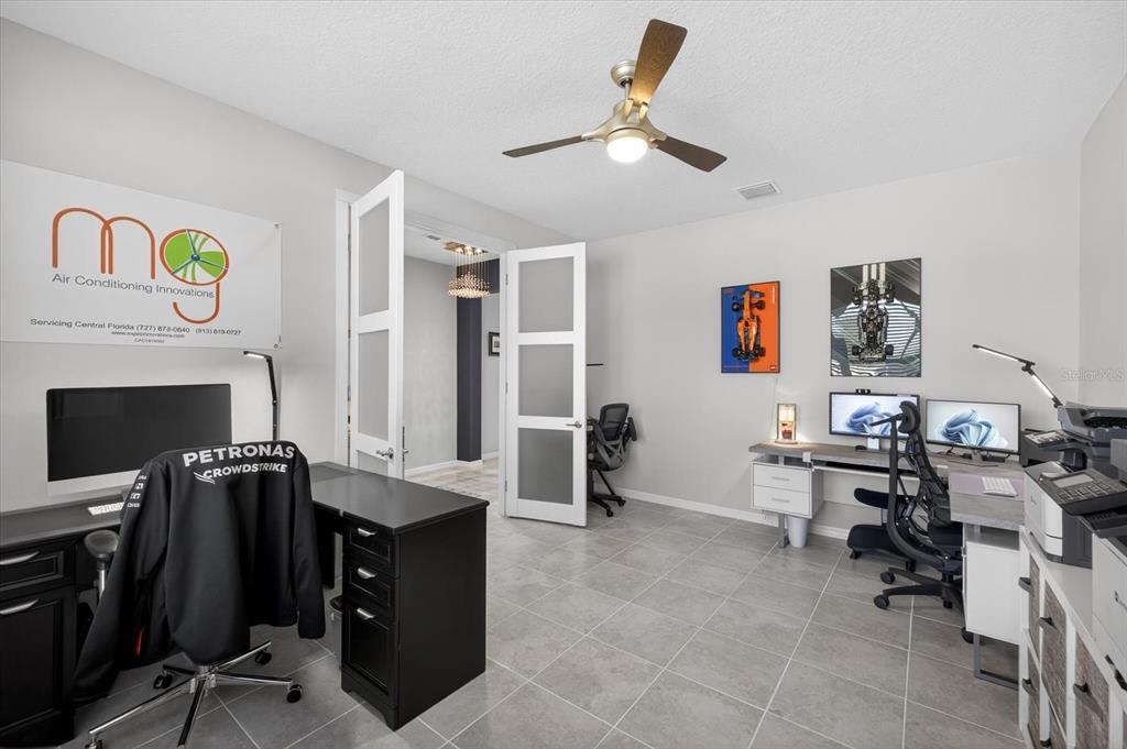 12740 Palapa Loop Spring Hill, FL 34610 - Photo 15 of 68 a view of a workspace with furniture