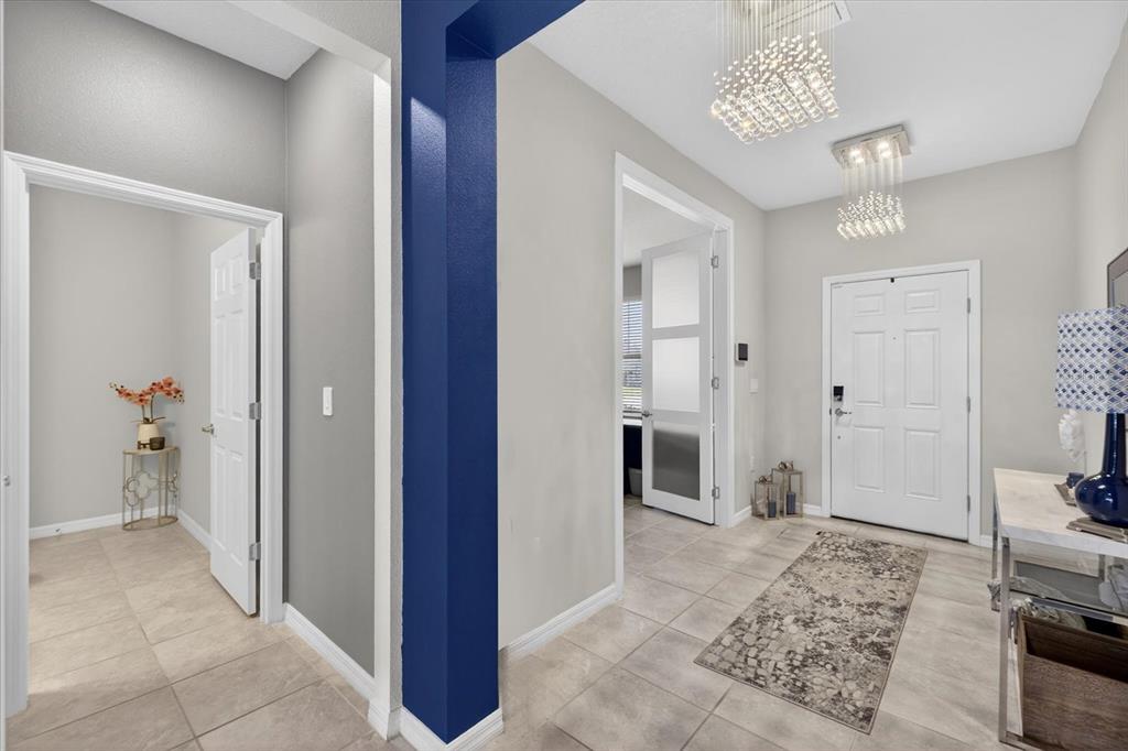 12740 Palapa Loop Spring Hill, FL 34610 - Photo 16 of 68 a view of livingroom with hardwood floor and a ceiling fan