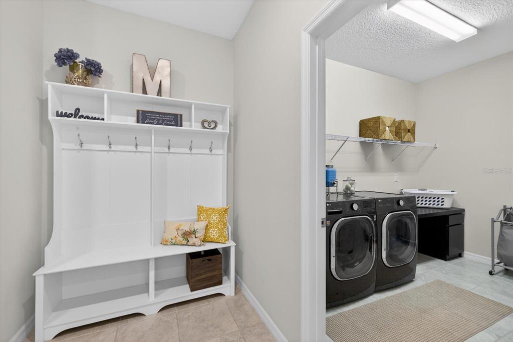 12740 Palapa Loop Spring Hill, FL 34610 - Photo 29 of 68 a view of kitchen and utility room